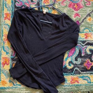 black fitted free people long sleeve with deep cut neck line